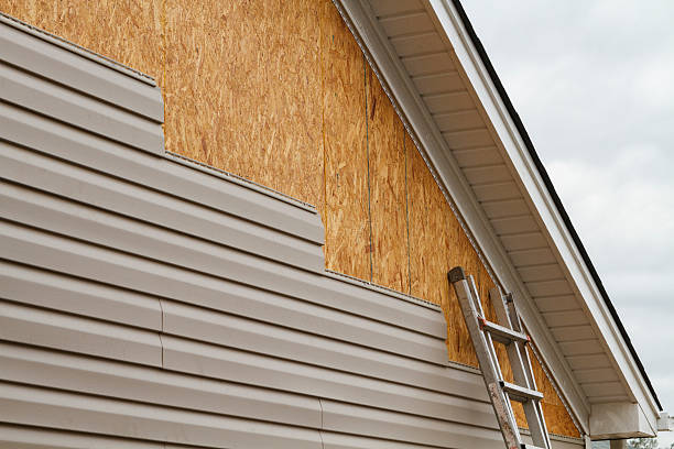 Professional Emergency Siding Repair technician working in Fort George G Meade, MD